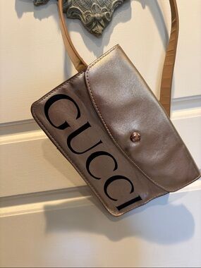 Gucci Metallic Taupe Logo fanny pack with Black Lettering